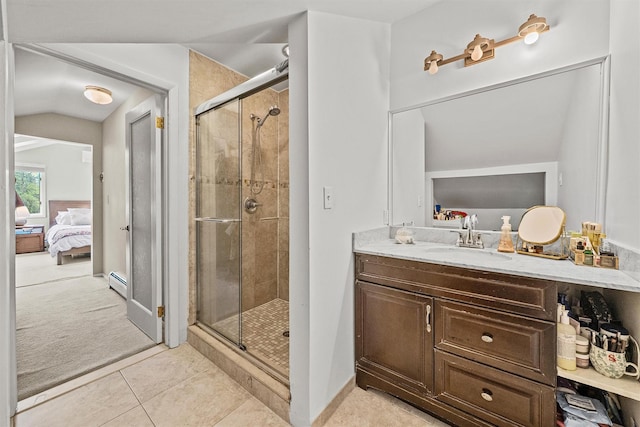 8 Wolf Rd, Croton-On-Hudson, NY 10520 - full bath featuring ensuite bath, a stall shower, vanity, lofted ceiling, and tile patterned flooring