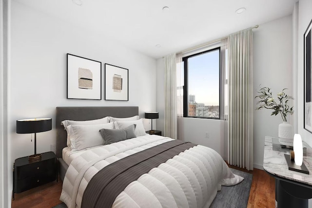 bedroom featuring wood finished floors