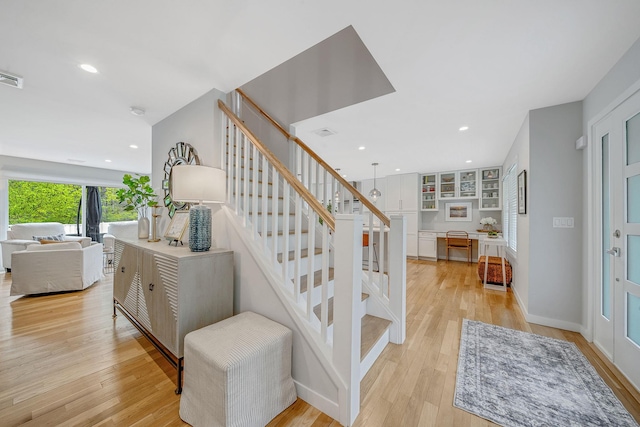 56 N Woods Rd, Baiting Hollow, NY 11933 - stairs featuring wood finished floors and recessed lighting