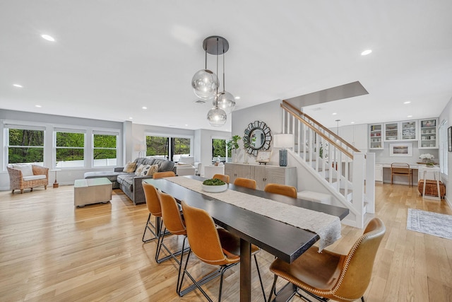 56 N Woods Rd, Baiting Hollow, NY 11933 - dining room featuring stairs, light wood-type flooring, and recessed lighting