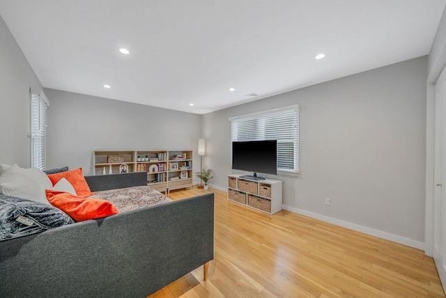 56 N Woods Rd, Baiting Hollow, NY 11933 - living room featuring wood finished floors, baseboards, recessed lighting, and plenty of natural light