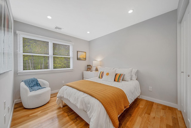 56 N Woods Rd, Baiting Hollow, NY 11933 - bedroom with baseboards, light wood-style flooring, and recessed lighting