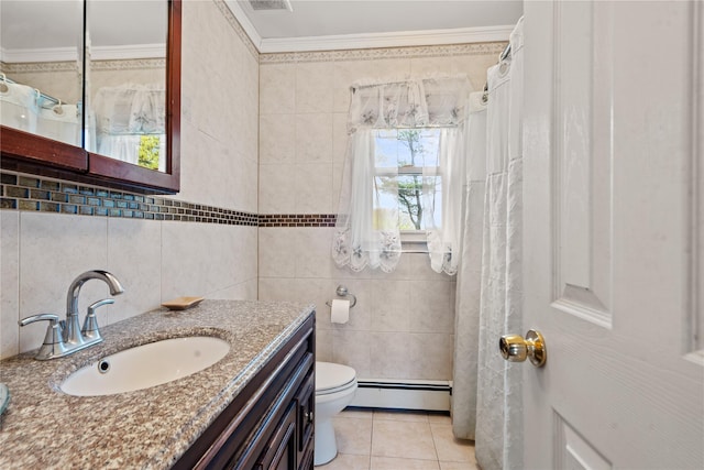 bathroom featuring toilet, tile patterned floors, tile walls, baseboard heating, and ornamental molding