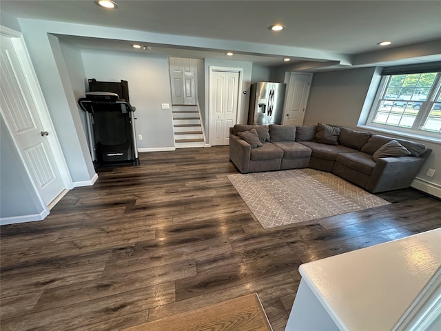living room featuring baseboards, stairs, recessed lighting, and dark wood-style floors