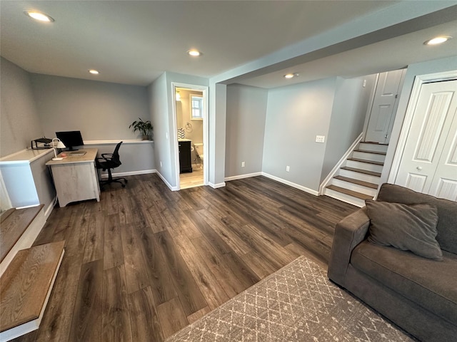 office space featuring baseboards, dark wood-style floors, and recessed lighting