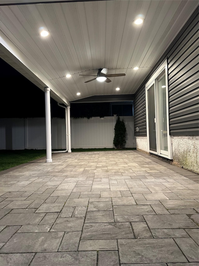 view of patio featuring ceiling fan