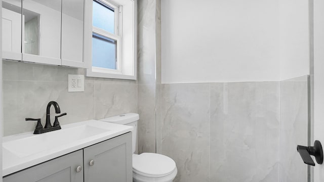 2227 Boller Ave, Bronx, NY 10475 - bathroom with toilet, tile walls, and vanity