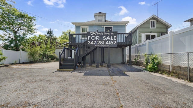 2227 Boller Ave, Bronx, NY 10475 - rear view of property with fence and stairs