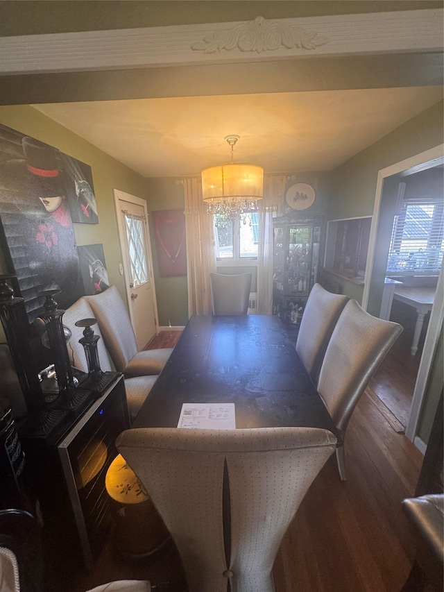 1001 Van Buren St, Baldwin, NY 11510 - dining room featuring wood finished floors and a chandelier