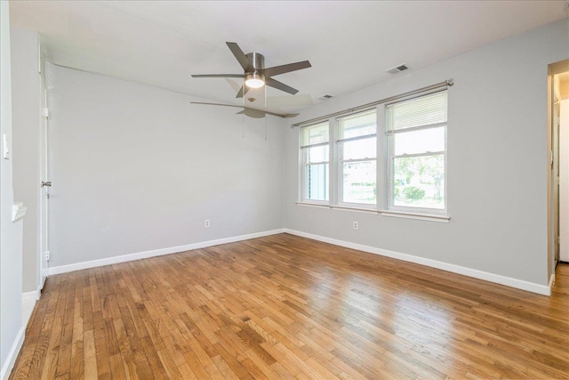 152 Artist Lake Dr Unit 152, Middle Island, NY 11953 - unfurnished room featuring light wood finished floors, a ceiling fan, and baseboards