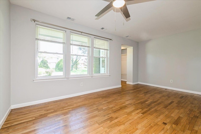 152 Artist Lake Dr Unit 152, Middle Island, NY 11953 - spare room with light wood-style flooring, ceiling fan, and baseboards