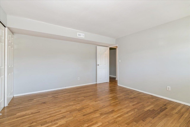 152 Artist Lake Dr Unit 152, Middle Island, NY 11953 - unfurnished room with baseboards and light wood-type flooring
