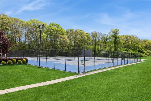152 Artist Lake Dr Unit 152, Middle Island, NY 11953 - view of tennis court with view of wooded area
