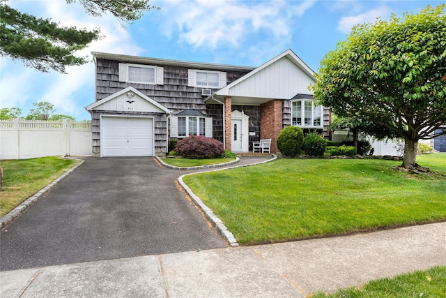 402 Spangle Dr, North Babylon, NY 11703 - view of front of property featuring a garage and driveway