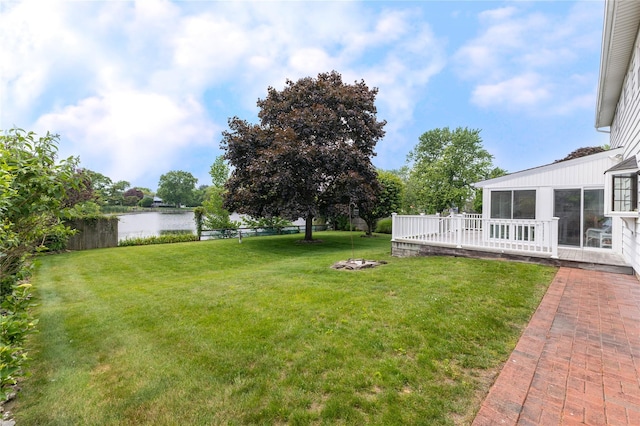 402 Spangle Dr, North Babylon, NY 11703 - view of grassy yard featuring a deck with water view