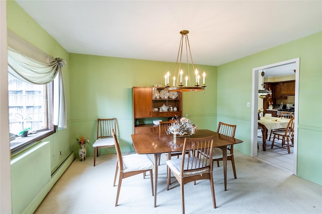 402 Spangle Dr, North Babylon, NY 11703 - dining room featuring a chandelier and light carpet