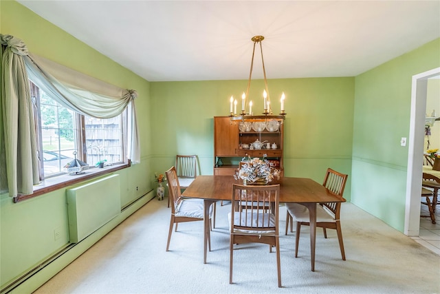 402 Spangle Dr, North Babylon, NY 11703 - dining space with a baseboard radiator, a chandelier, and light carpet