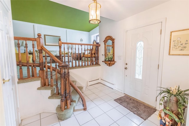 402 Spangle Dr, North Babylon, NY 11703 - tiled foyer entrance featuring a baseboard heating unit and stairway