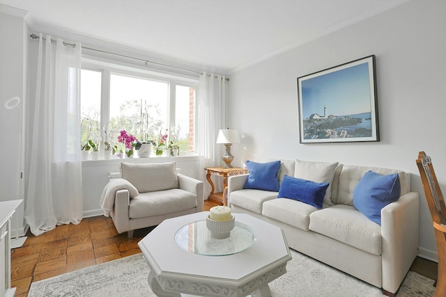 living room featuring crown molding