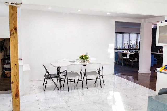dining area featuring recessed lighting