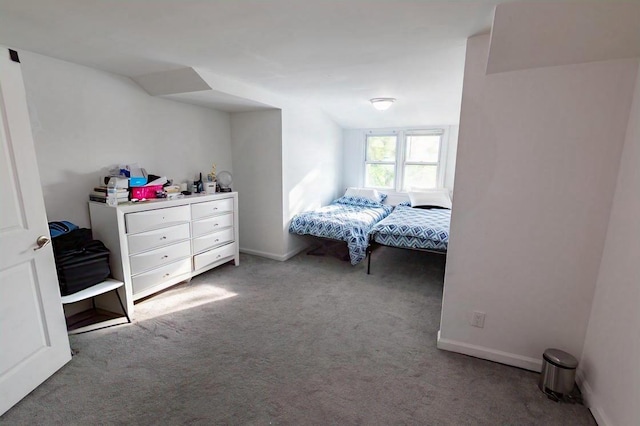 carpeted bedroom with baseboards