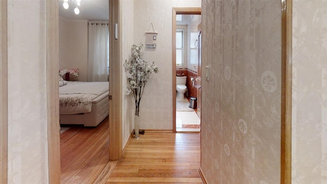 hallway with light wood-type flooring