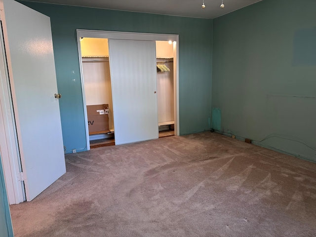 unfurnished bedroom with carpet
