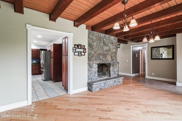 346 Gifford Hollow Rd, Call Listing Agent, NY 12023 - unfurnished living room with wooden ceiling, light wood-style flooring, a chandelier, beamed ceiling, and a fireplace