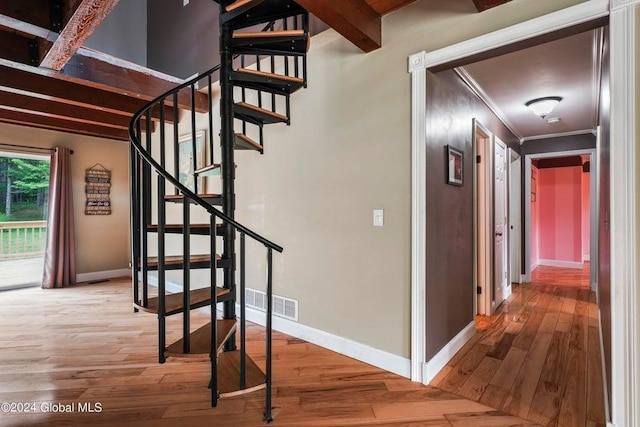 346 Gifford Hollow Rd, Call Listing Agent, NY 12023 - stairway featuring baseboards, beamed ceiling, hardwood / wood-style flooring, and crown molding