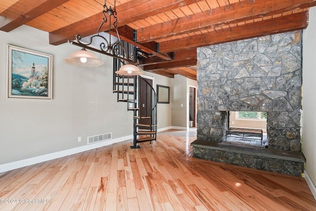 346 Gifford Hollow Rd, Call Listing Agent, NY 12023 - unfurnished living room featuring wooden ceiling, beamed ceiling, stairway, baseboards, and hardwood / wood-style floors