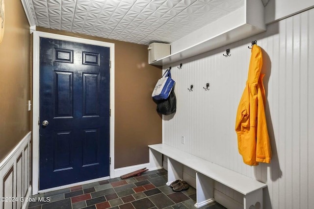 346 Gifford Hollow Rd, Call Listing Agent, NY 12023 - mudroom with baseboards, an ornate ceiling, and stone finish floors