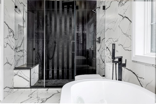 full bath featuring toilet, a stall shower, and marble tiled floors