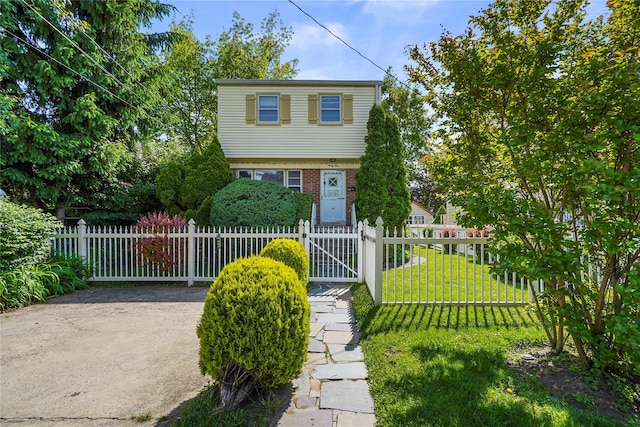 31 Westwood Ave, New Rochelle, NY 10801 - view of front of home featuring a gate and brick siding