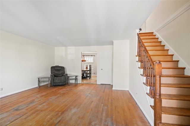 31 Westwood Ave, New Rochelle, NY 10801 - sitting room with hardwood / wood-style floors, stairs, and baseboards