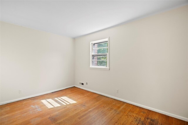 31 Westwood Ave, New Rochelle, NY 10801 - empty room featuring baseboards and hardwood / wood-style flooring