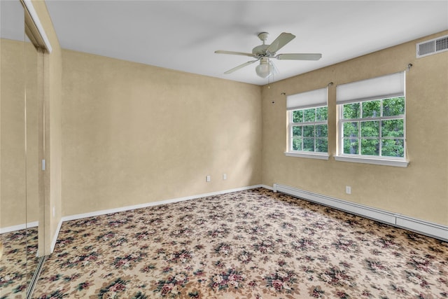 534 Puritan Dr, Shirley, NY 11967 - carpeted spare room featuring a baseboard radiator, a ceiling fan, and baseboards