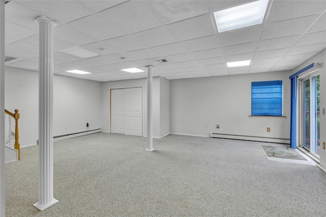 534 Puritan Dr, Shirley, NY 11967 - below grade area featuring a baseboard heating unit, a paneled ceiling, carpet, and baseboards