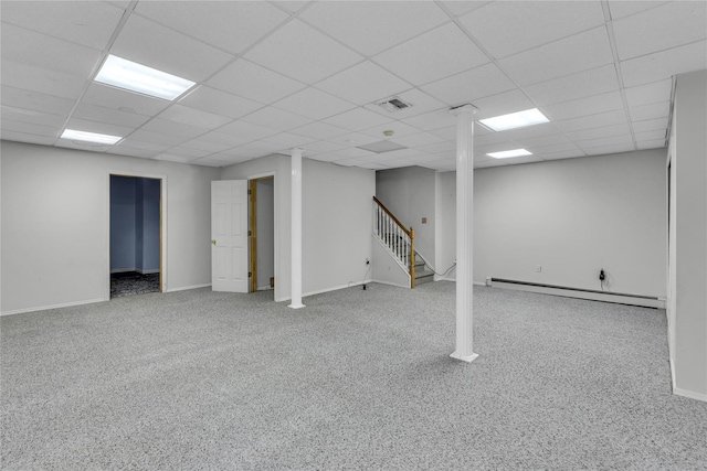 534 Puritan Dr, Shirley, NY 11967 - finished below grade area with a baseboard radiator, stairs, a paneled ceiling, baseboards, and carpet flooring