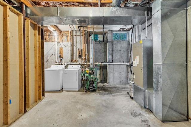 534 Puritan Dr, Shirley, NY 11967 - basement featuring washing machine and dryer and a heating unit
