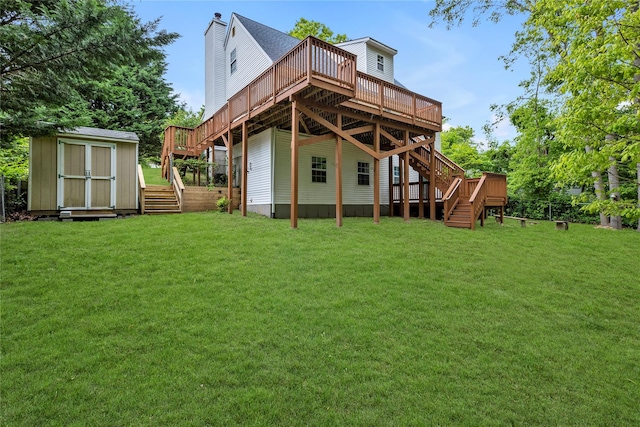 534 Puritan Dr, Shirley, NY 11967 - back of house featuring stairway, a wooden deck, and a yard