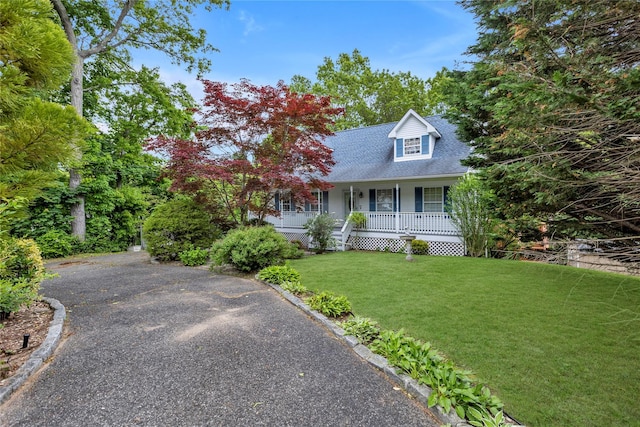 534 Puritan Dr, Shirley, NY 11967 - cape cod house with a porch, a front lawn, and a shingled roof
