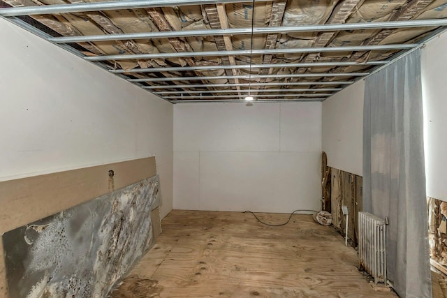 finished basement with radiator heating unit