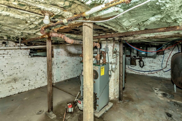 unfinished basement with heating fuel and electric panel