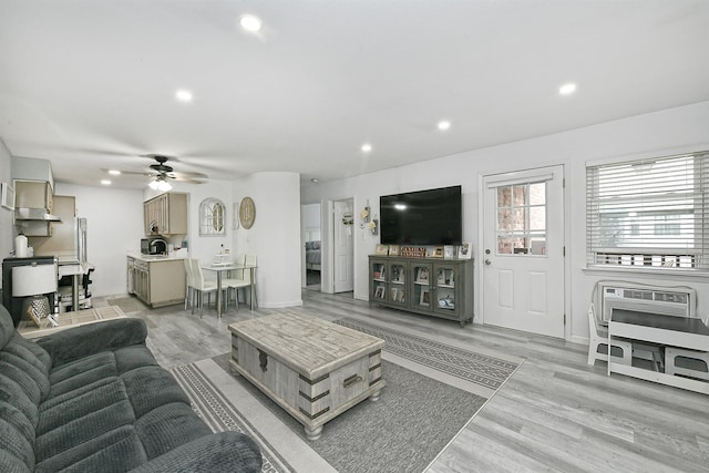 198 Millard Ave Unit 198, West Babylon, NY 11704 - living area featuring recessed lighting, a ceiling fan, light wood-style flooring, and baseboards