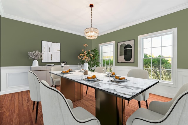 7 Viola Ct, Wappingers Falls, NY 12590 - dining room with wood finished floors, a wainscoted wall, ornamental molding, a chandelier, and a decorative wall