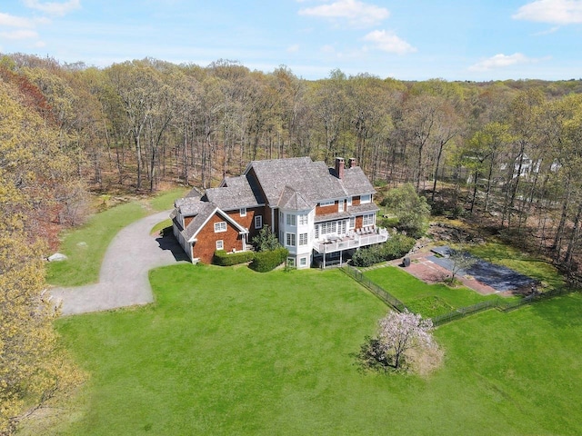 bird's eye view featuring a forest view