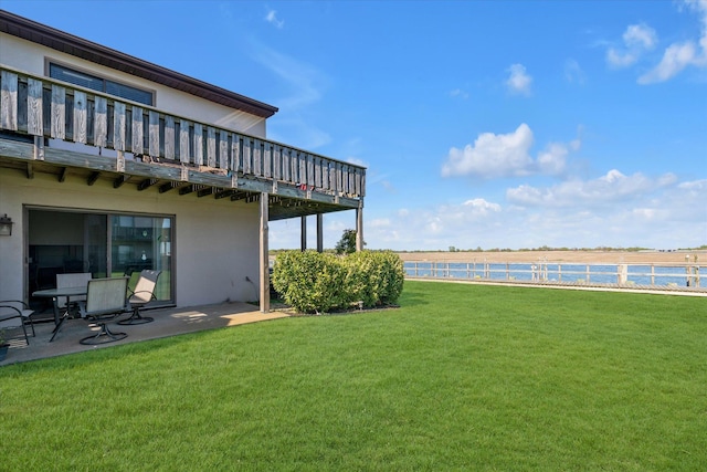 view of yard featuring a patio and a deck