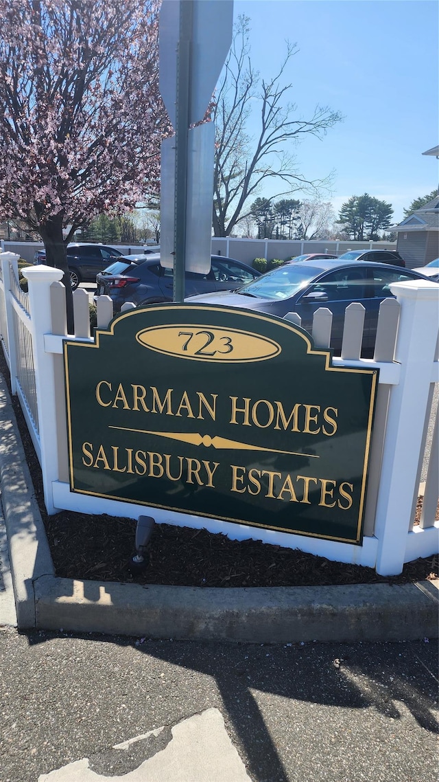 723 Carman Ave Unit 14, Westbury, NY 11590 - community sign with uncovered parking