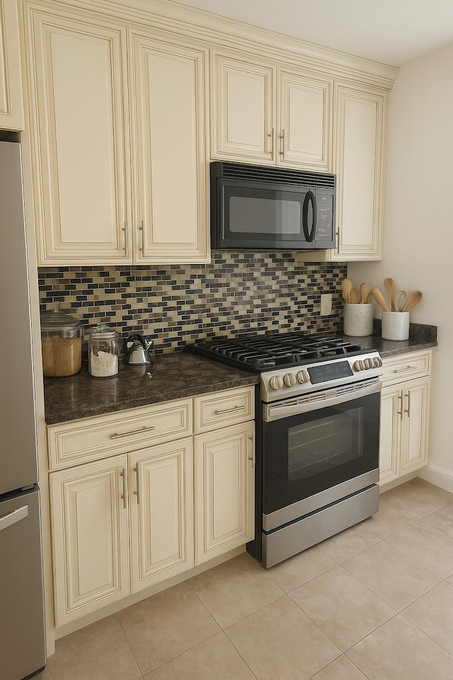 723 Carman Ave Unit 14, Westbury, NY 11590 - kitchen with cream cabinetry, stainless steel appliances, tasteful backsplash, and light tile patterned flooring