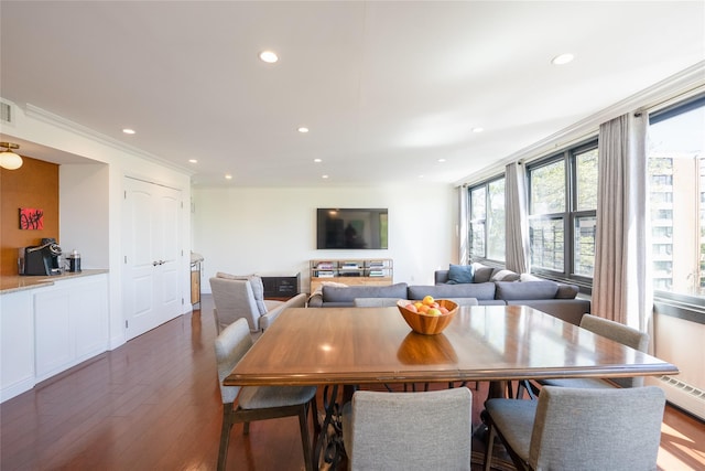 dining area with recessed lighting and dark wood-style flooring